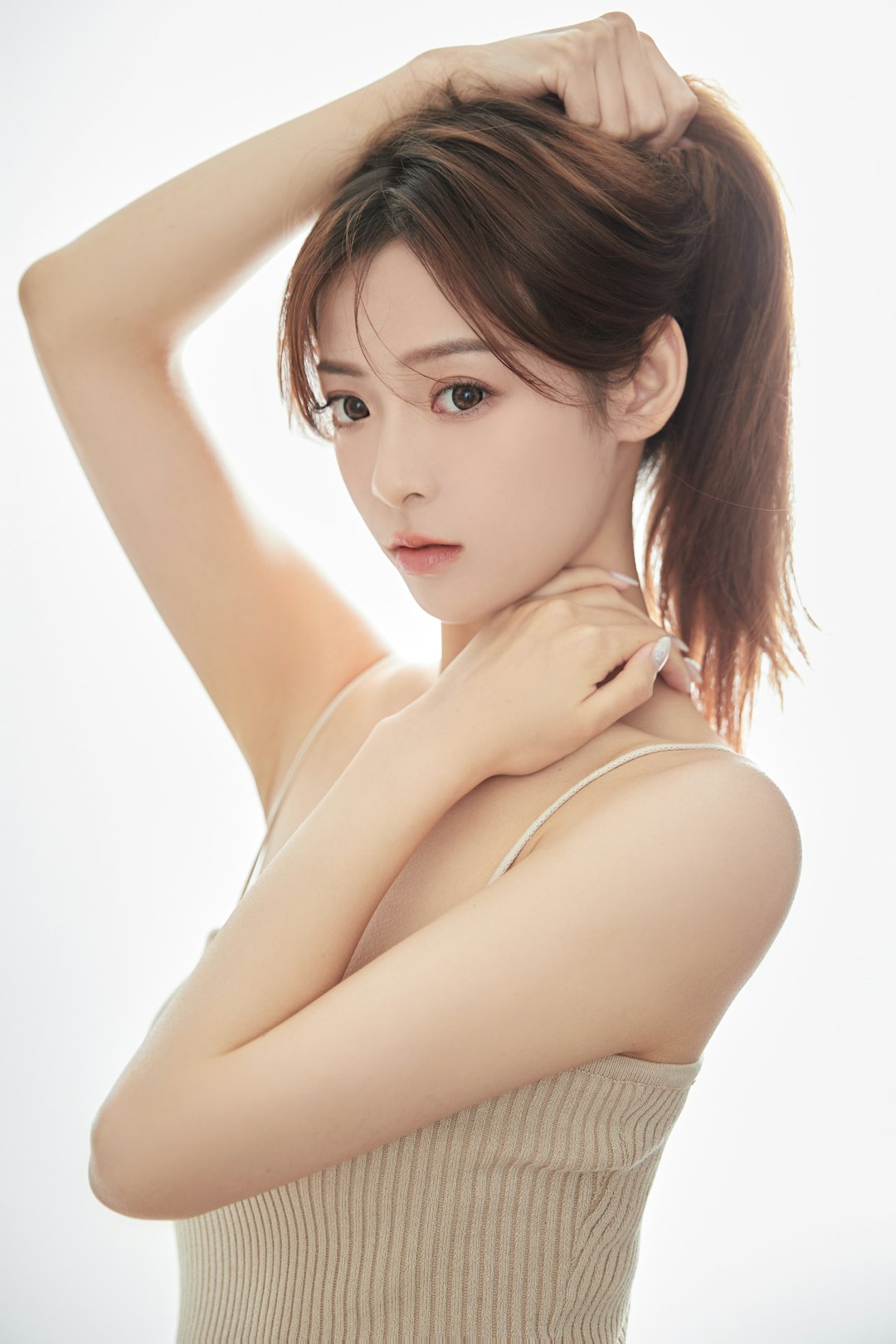 services-03 a-young-woman-with-a-ponytail-is-posing-for-a-picture-aytnfkr8dty